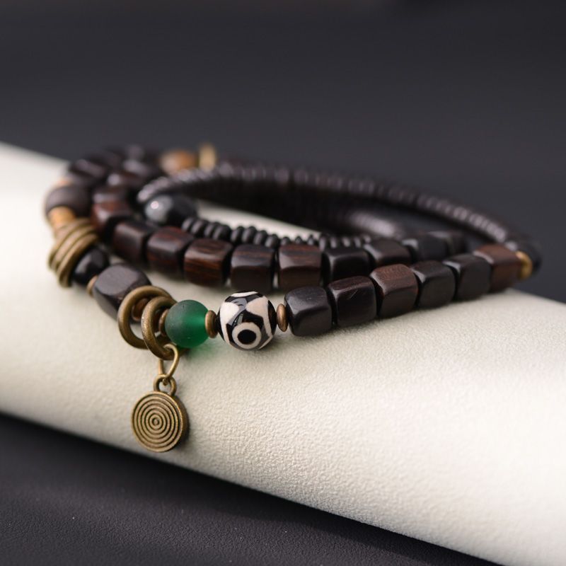 Original design handcrafted black walnut bracelet, worn to bring good luck.