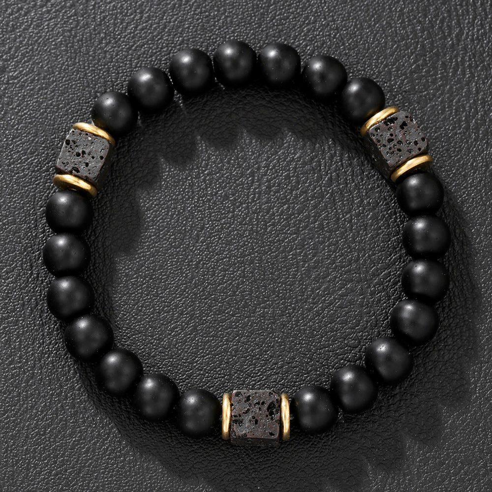 Volcanic stone bracelet, enhances energy and safeguards balance.