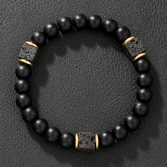 Volcanic stone bracelet, enhances energy and safeguards balance.