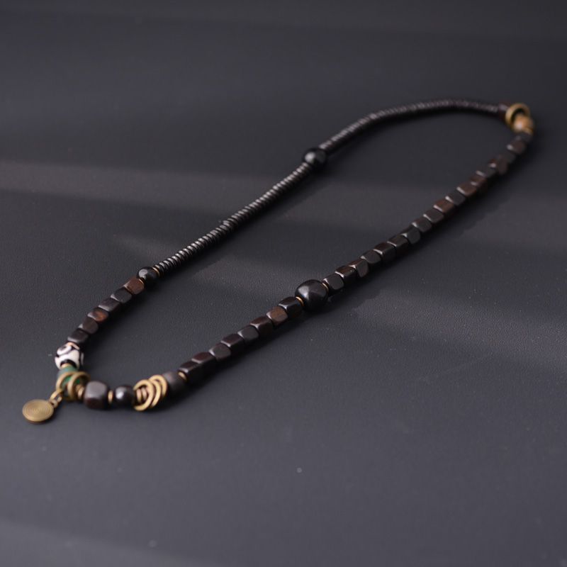 Original design handcrafted black walnut bracelet, worn to bring good luck.