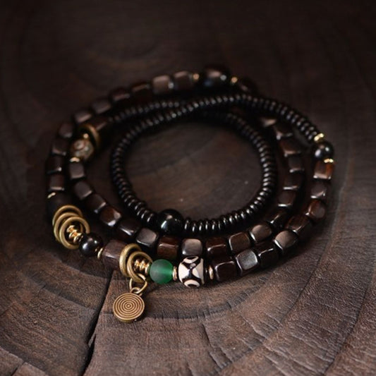 Original design handcrafted black walnut bracelet, worn to bring good luck.